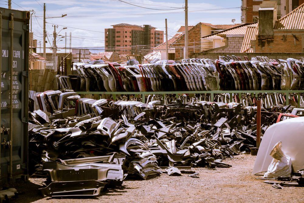 How can automotive parts management software prevent stockouts and reduce excess inventory?